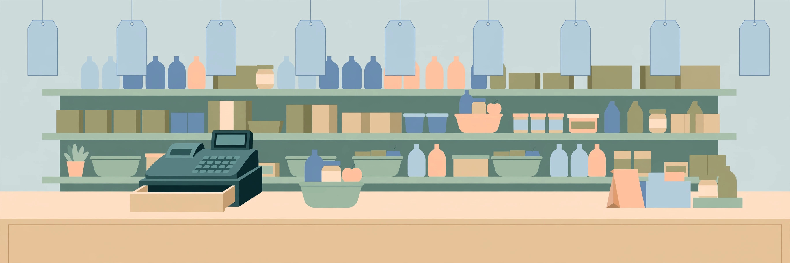 Retail till counter with shelves of goods and blank price tags hanging above